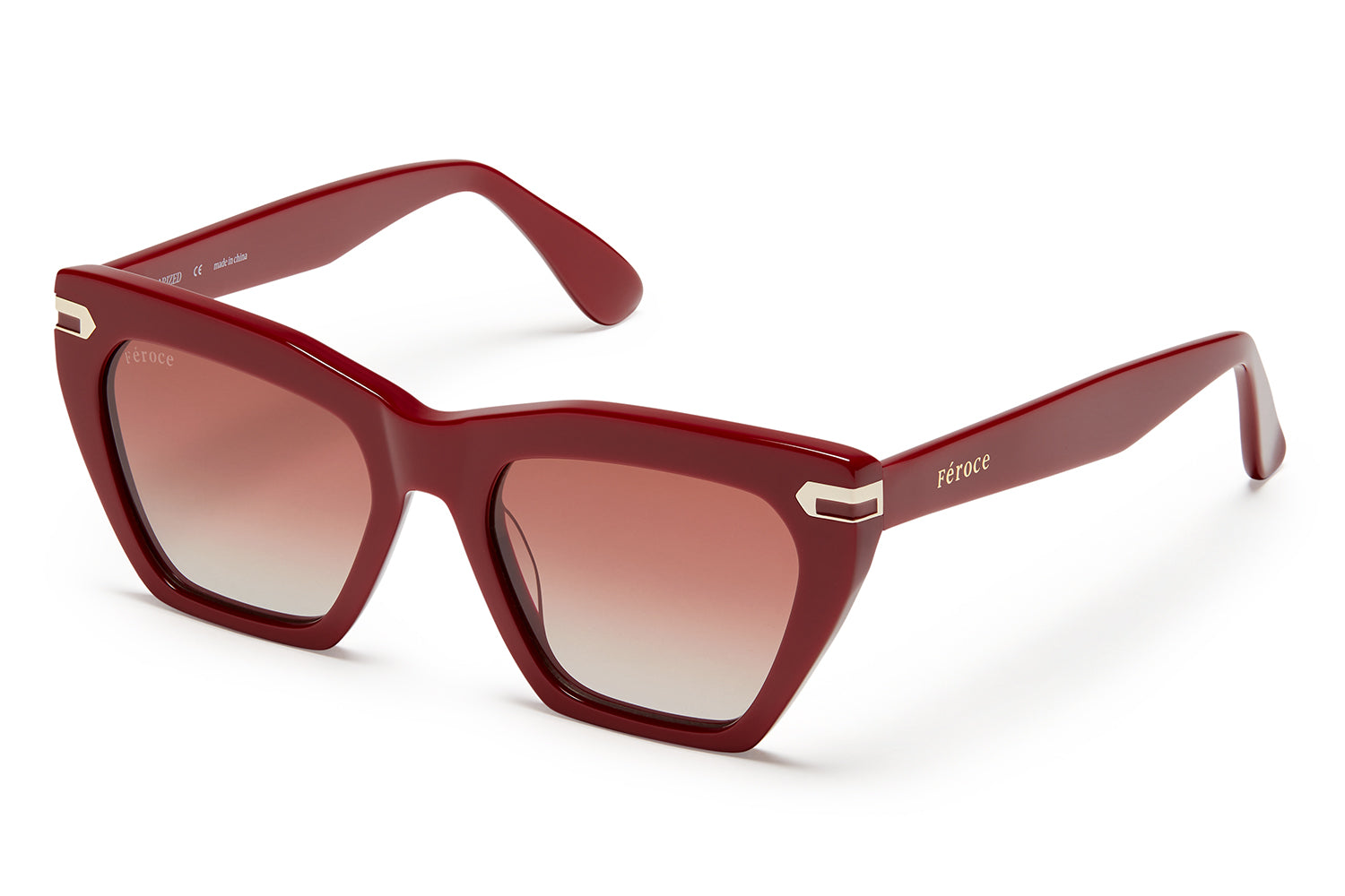 Burgundy acetate sunglasses with red gradient lenses and gold tone hardware