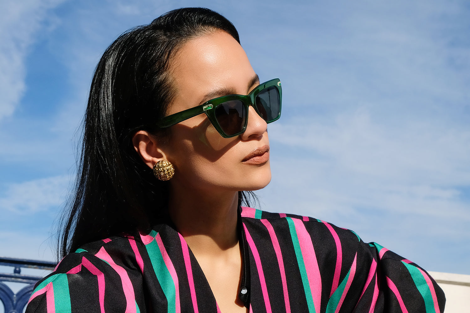 Vert acetate sunglasses with dark green lenses and gold tone hardware