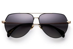 Black acetate sunglasses with dark grey lenses and gold tone hardware