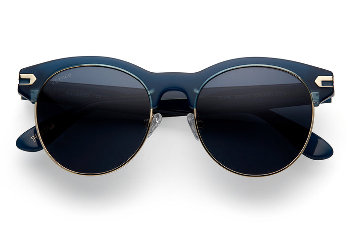 Marine acetate sunglasses with stainless steel bottom rim with dark violet lenses and gold tone hardware