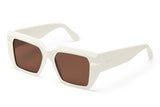 Creme sunglasses with grey lenses and gold tone hardware