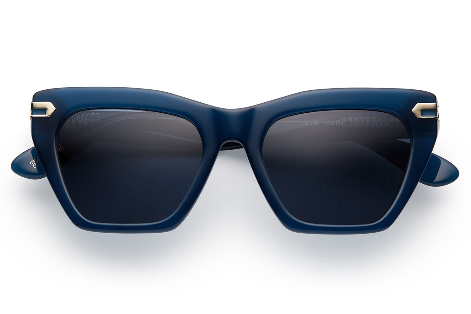 Dark blue acetate sunglasses with dark blue lenses and gold tone hardware