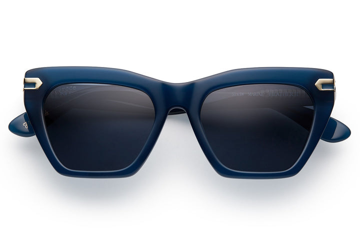 Dark blue acetate sunglasses with dark blue lenses and gold tone hardware