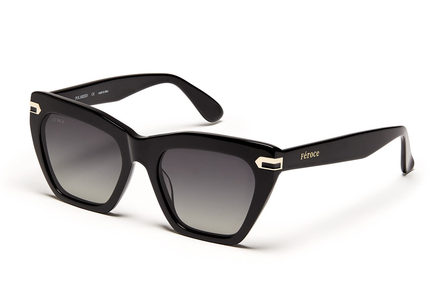 Black acetate sunglasses with dark grey lenses and gold tone hardware.