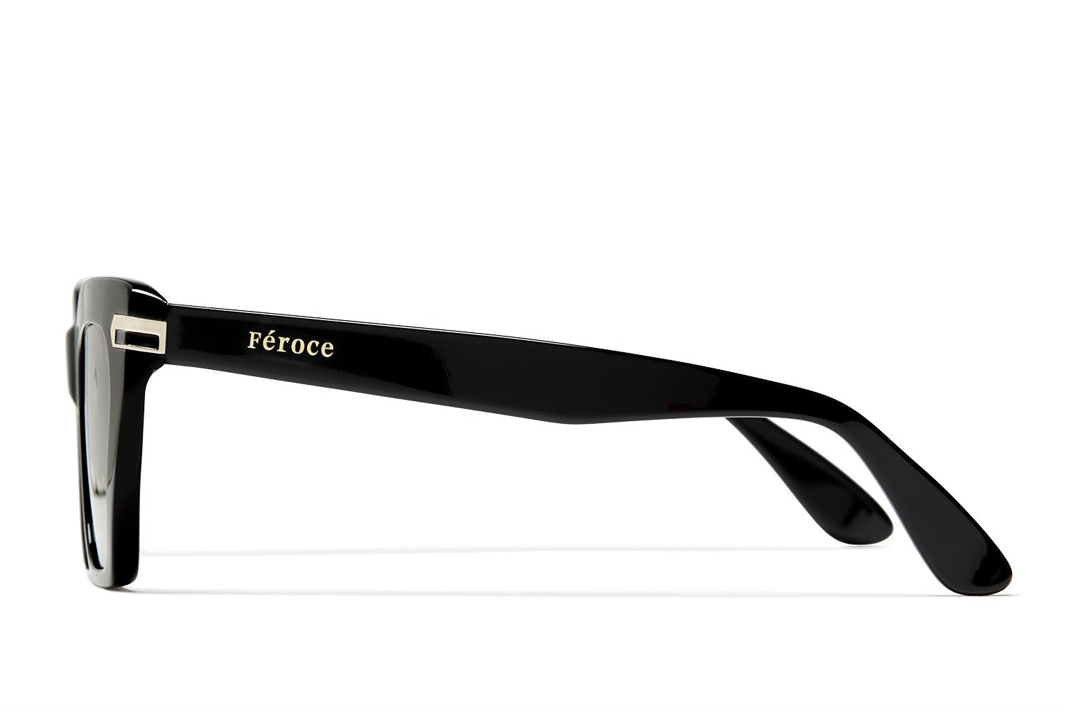 Black acetate sunglasses with dark grey lenses and gold tone hardware.