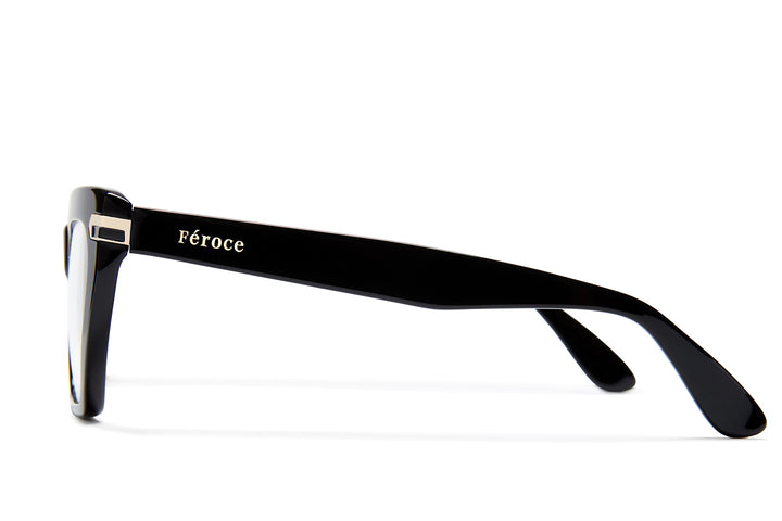 Black acetate glasses with clear lenses and gold tone hardware